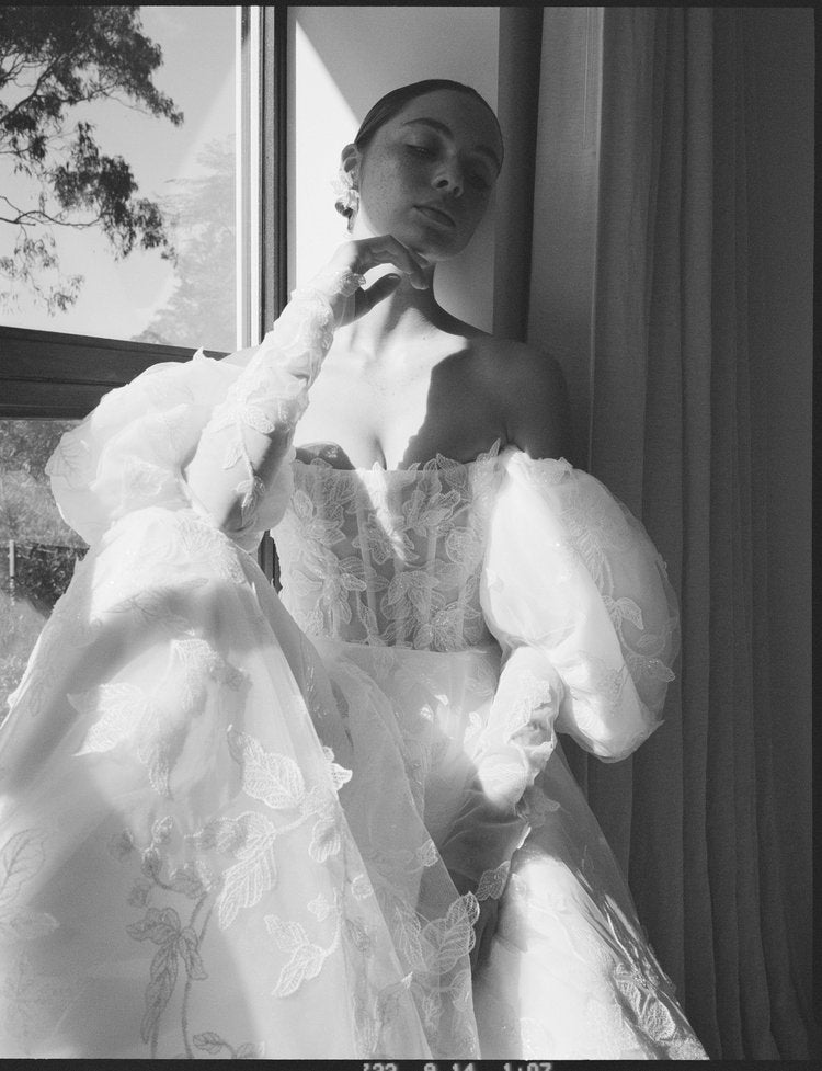 Alena Leena wedding dress styled with A.B. Ellie bridal accessories