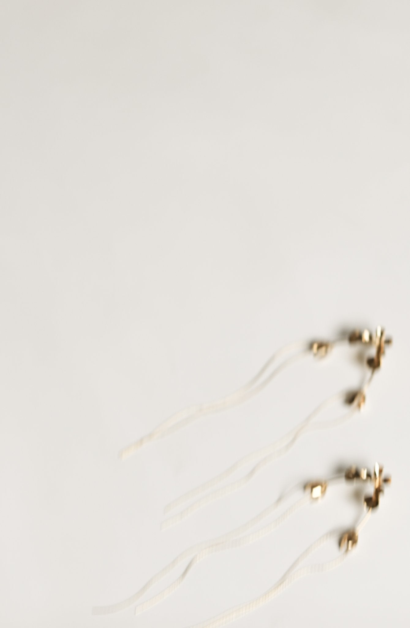 Haselnussfarbene Quasten - Ausverkauf