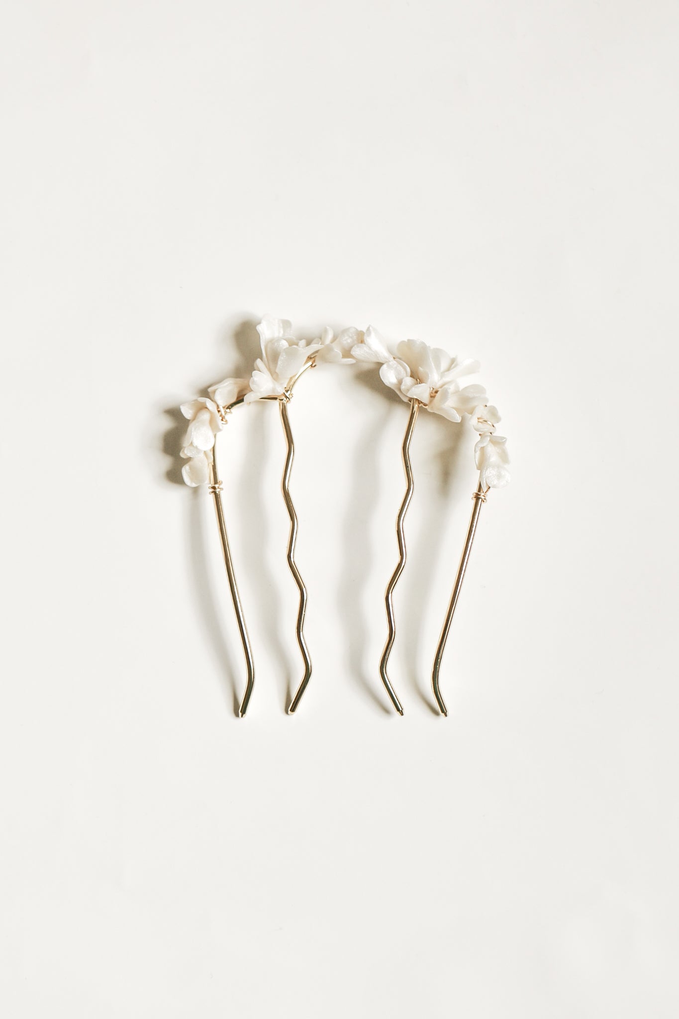 Flat photo of the Blossom bridal comb by AB Ellie on white background