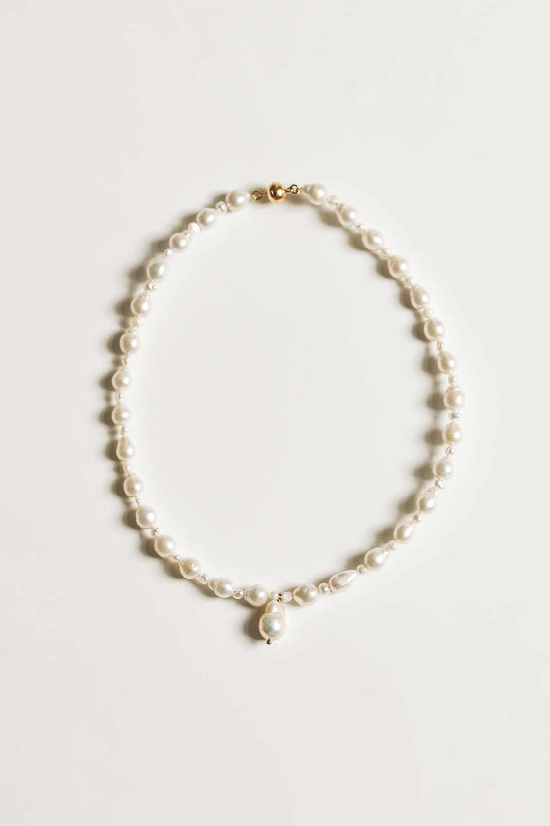 Flat view of the Demi Baroque freshwater pearl necklace by AB Ellie on white background