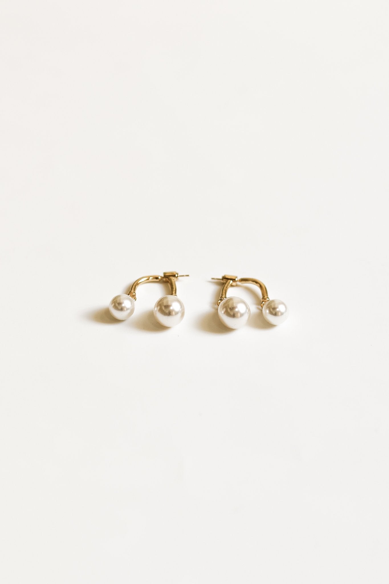 gold-asym-gilded-pearl-drops-earring-by-abellie.jpg