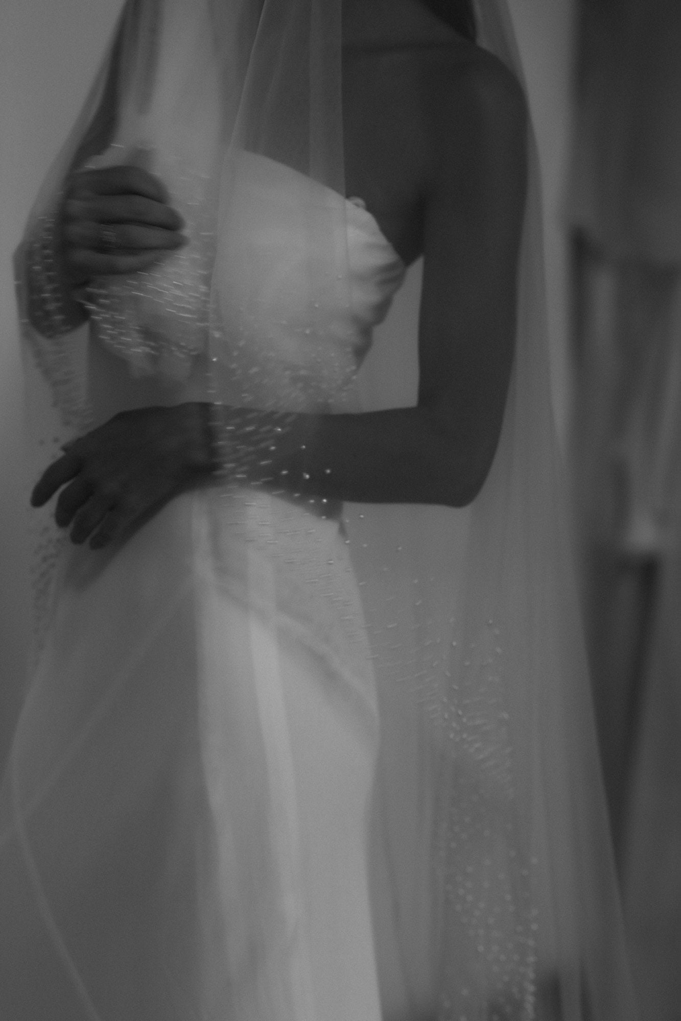 Hayden Pearl Edge wedding veil on bride wearing a strapless wedding gown