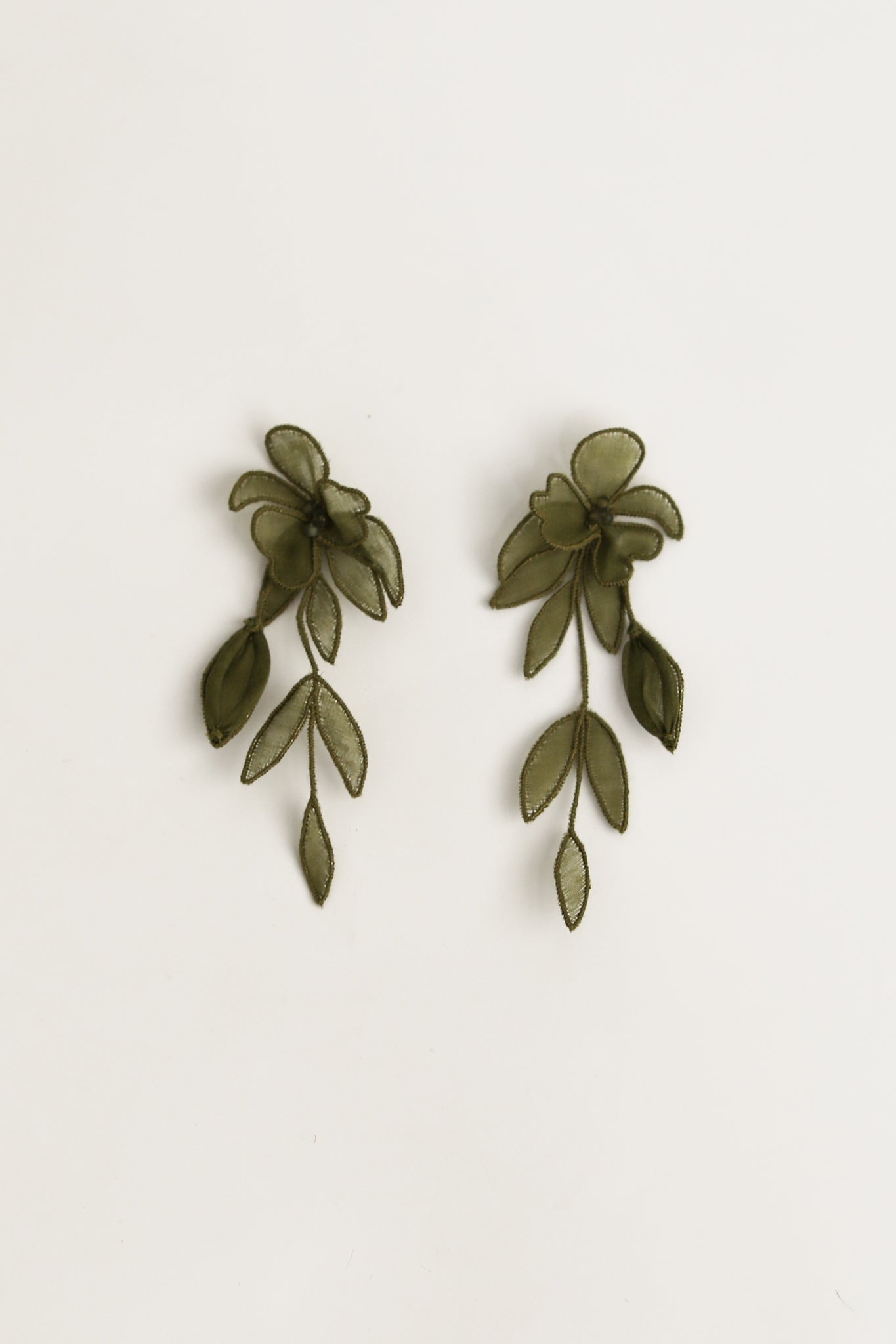 Flat photo of the olive mini charlee tier earrings by AB Ellie on white background