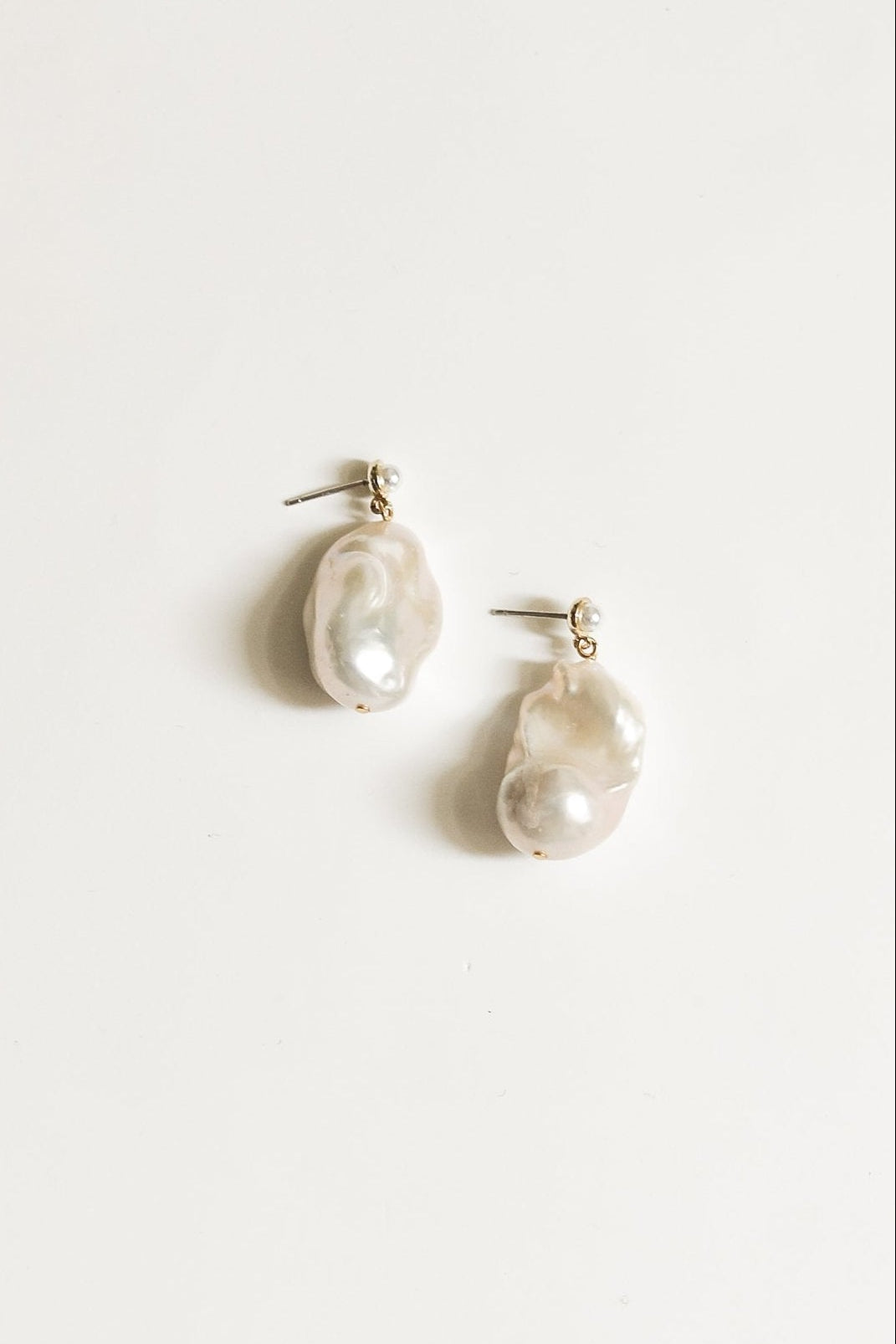 Photo of the Statement Baroque Pearl Drop Earrings by AB Ellie on white background