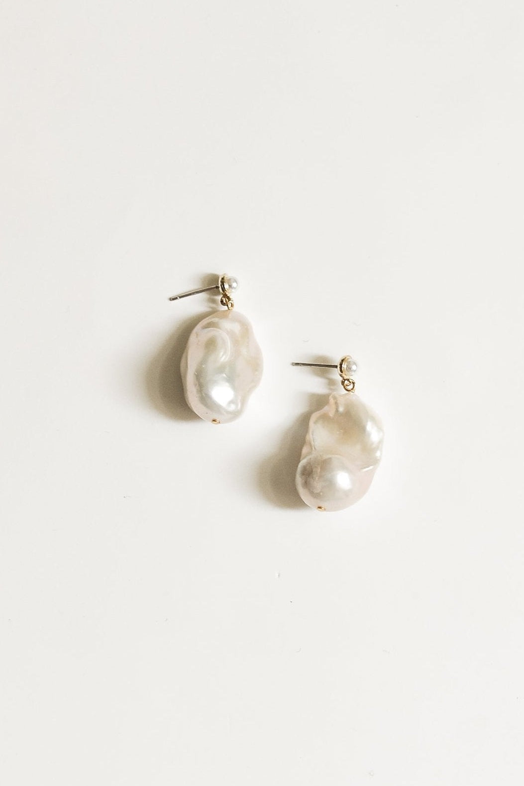Photo of the Statement Baroque Pearl Drop Earrings by AB Ellie on white background