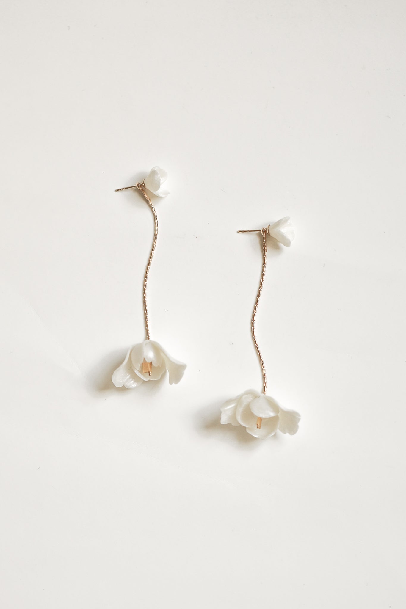 Minimal ivory flower Blossom Strand two in one bridal earring by A.B. Ellie bridal jewelry designer 