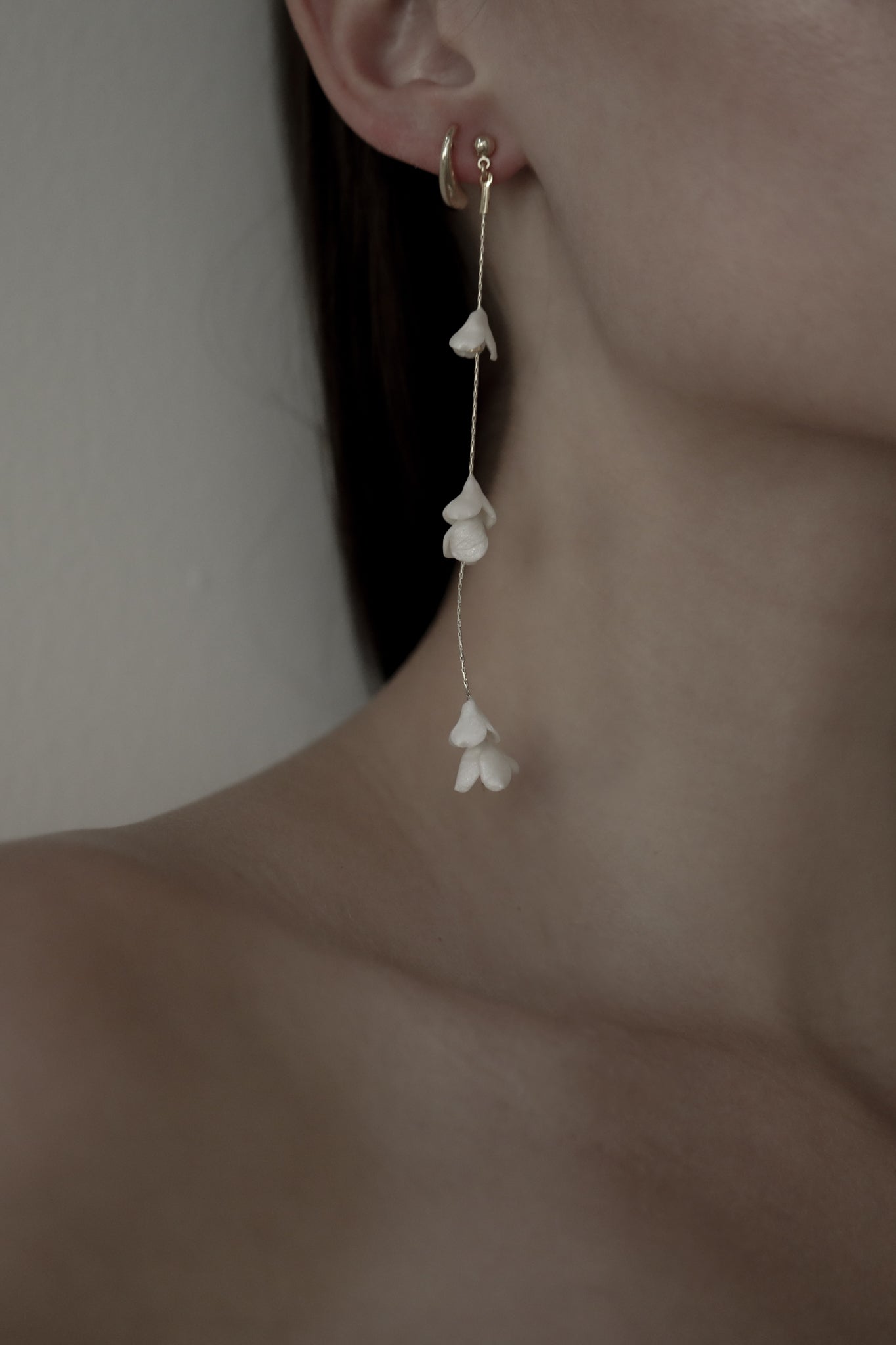 Side profile photo of bride wearing the Blossom Strand earrings by AB Ellie 