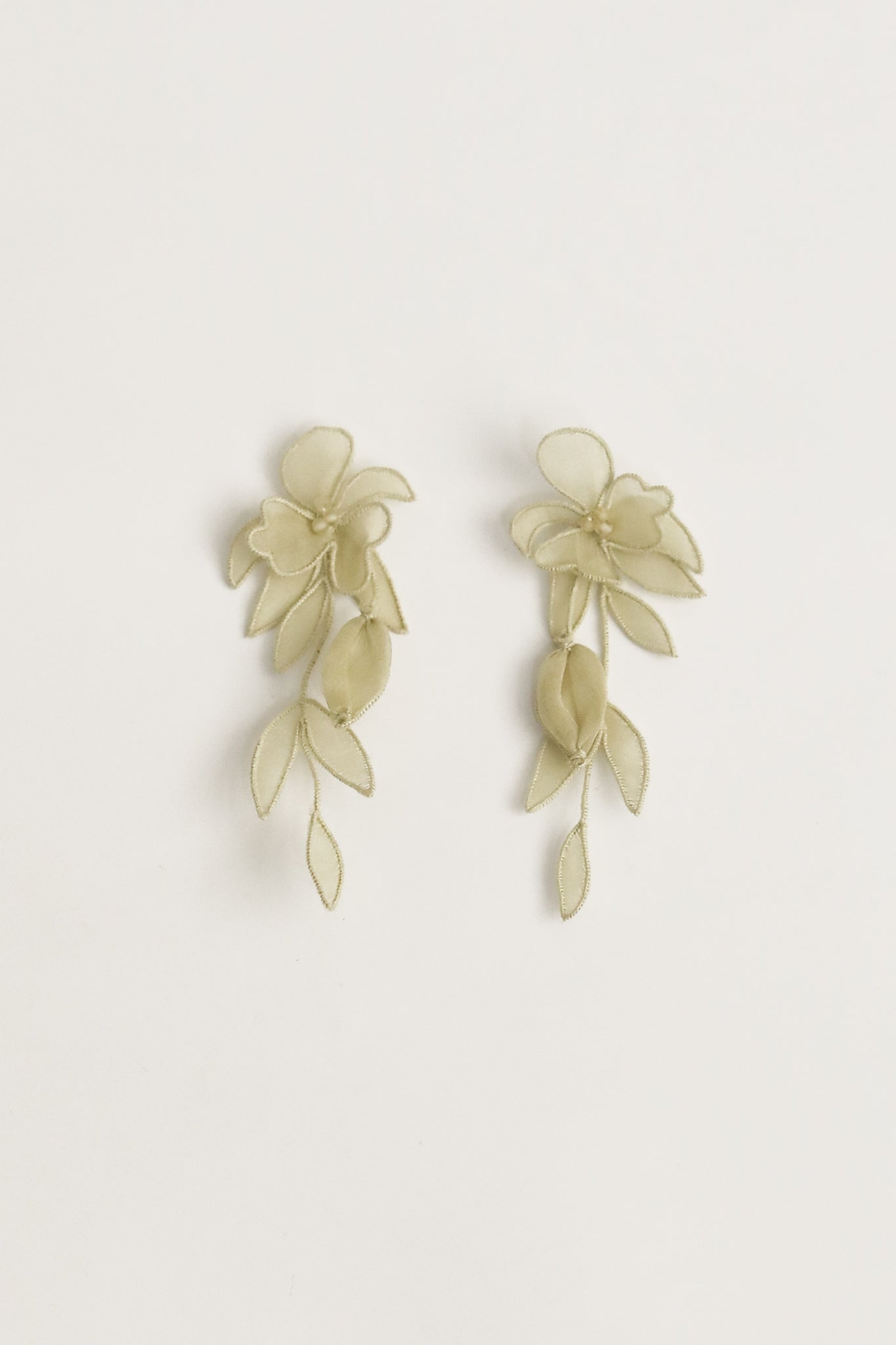 Flat photo of mini Charlee tier earrings in Butter color by AB Ellie on white background