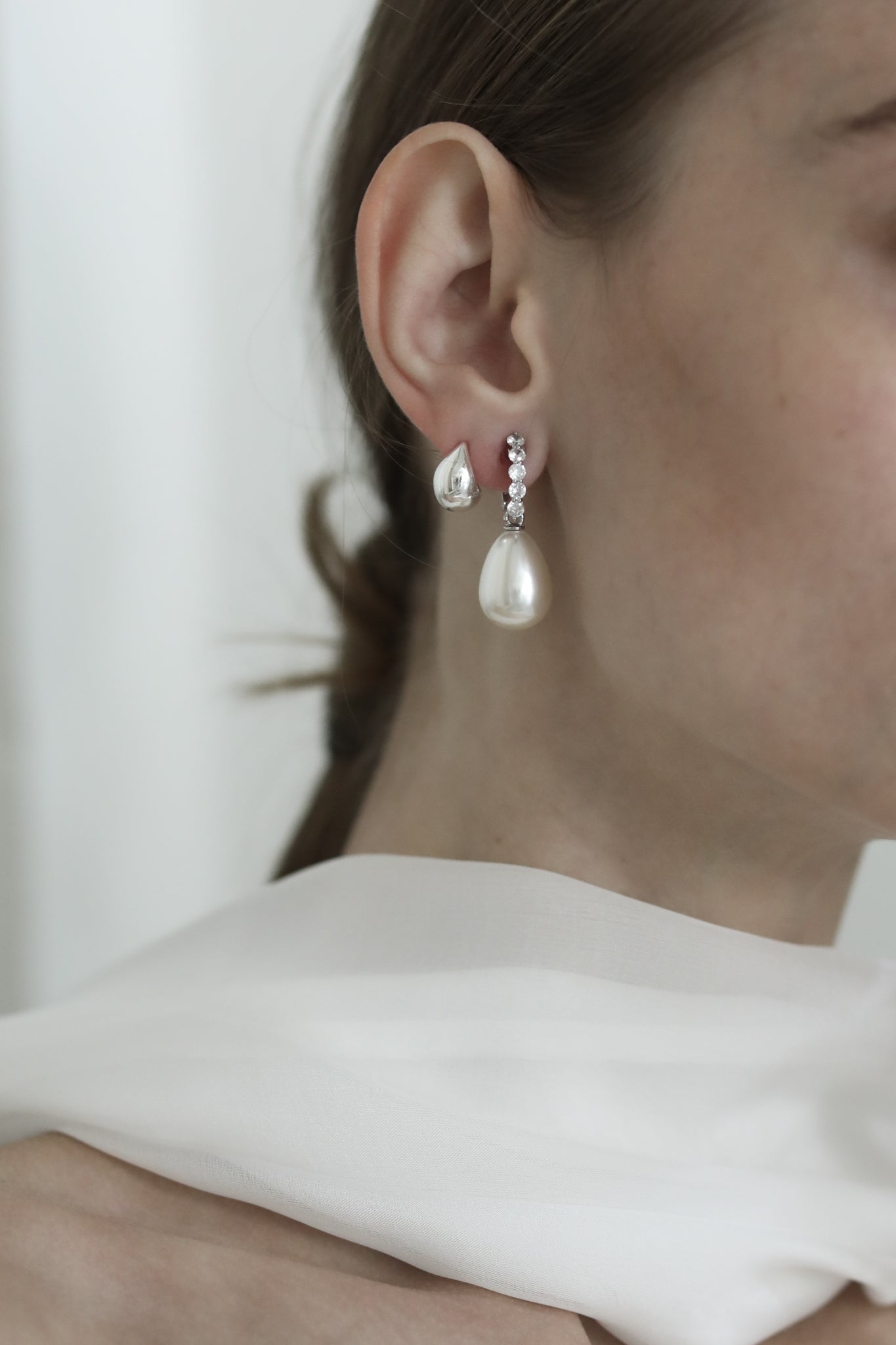 Photo of Bride wearing the gold pave pearl drop earrings by AB Ellie