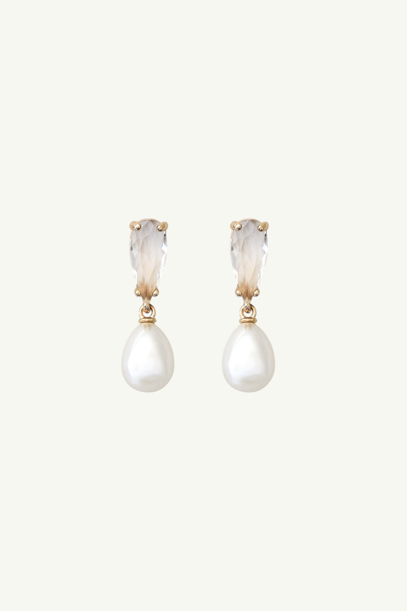 Flat image of crystal dewdrop and pearl drop earrings by AB Ellie on white background