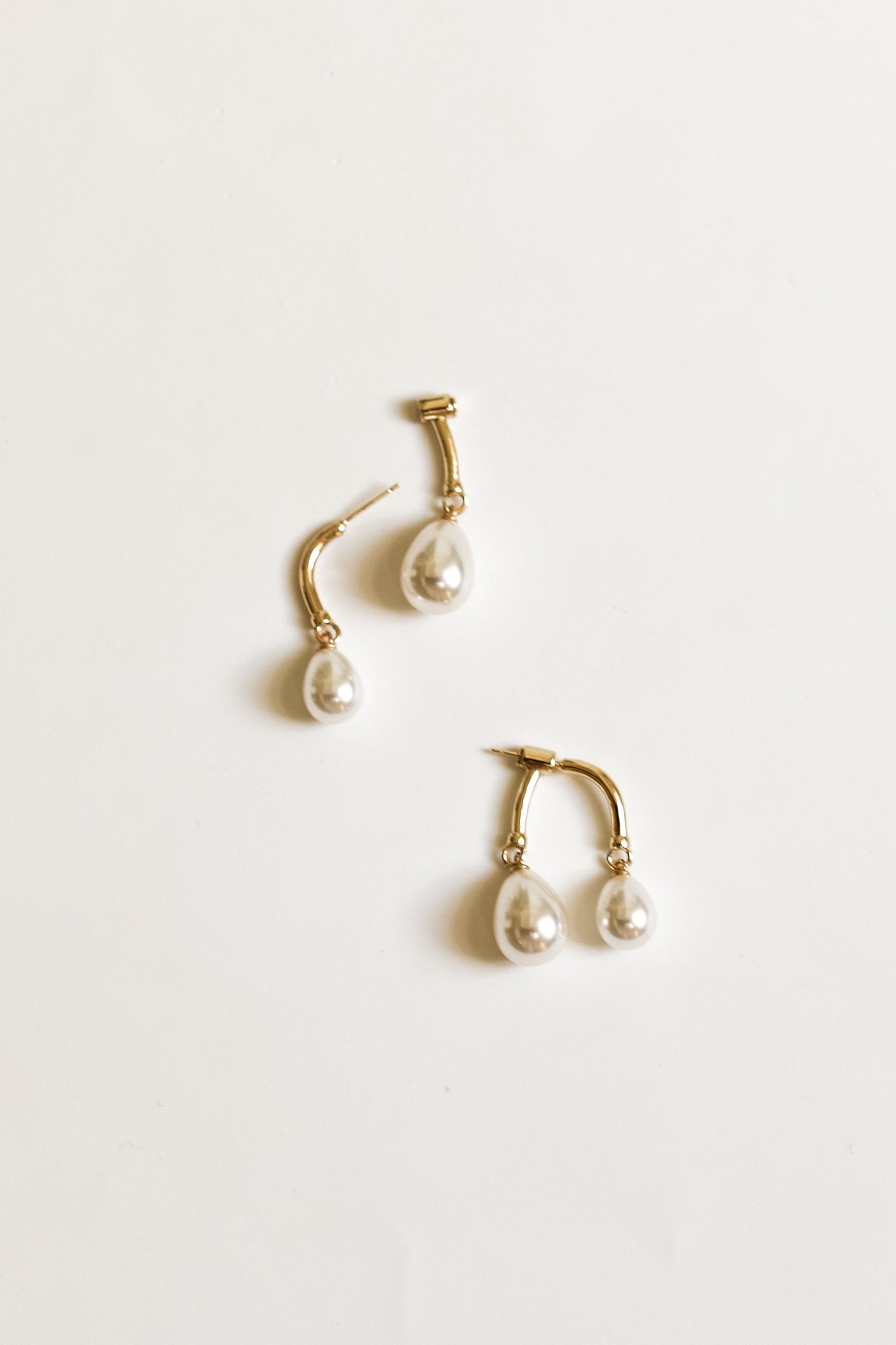 gold-asym-gilded-pearl-drops-earring-by-abellie-2.jpg