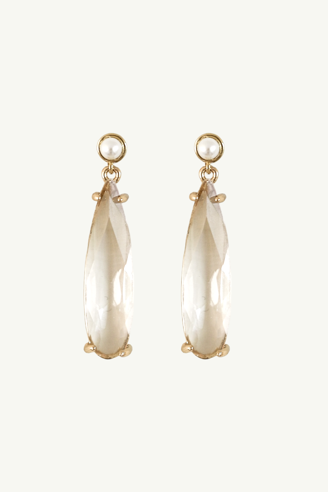 Flat photo of the gold Perla Dewdrop Earrings by AB Ellie on white background