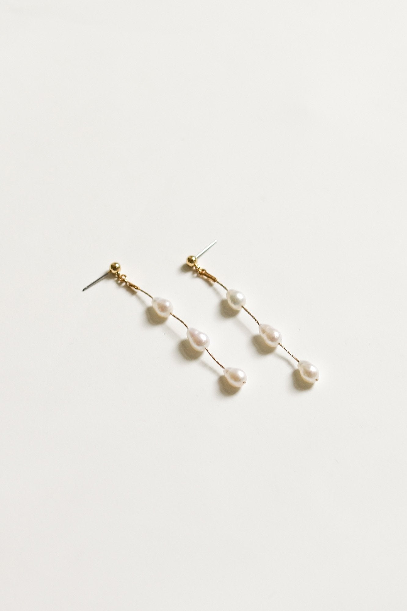 perla-half-pearl-strand-earring-hdwr-by-abellie-2.jpg